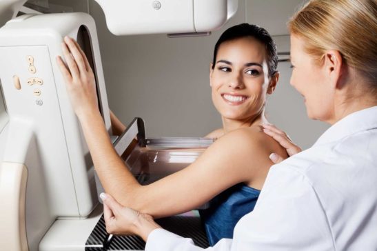 woman undergoing breast mammography at houston breast center