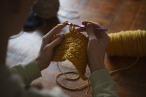 two hands knitting